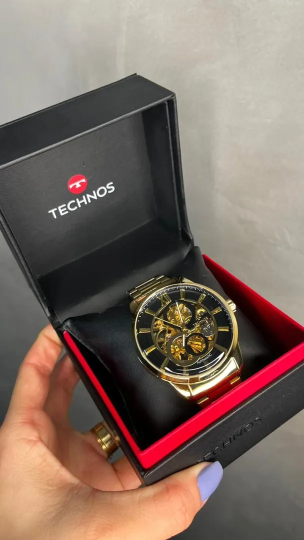 RELÓGIO TECHNOS DOURADO AUTOMÁTICO PULSEIRA EM AÇO INTERIOR PRETO VIDRO ABAULADO - COR DOURADO